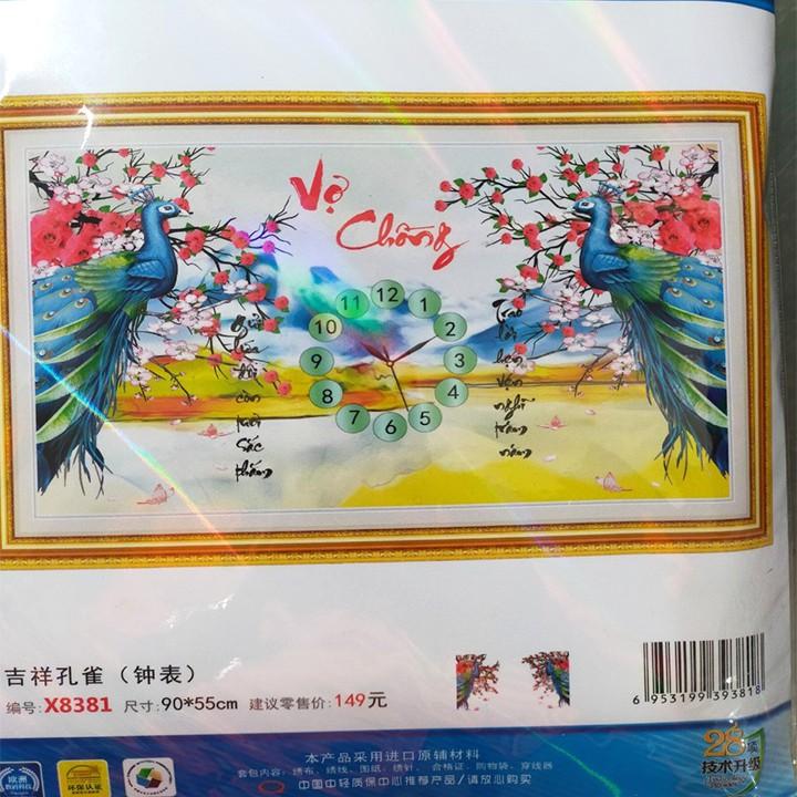 Tranh thêu vợ chồng công xanh đồng hồ X8381 - kích thước: 90 * 55cm.