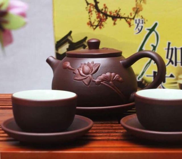 Bộ ấm chén tử sa liên hoa đắp nổi