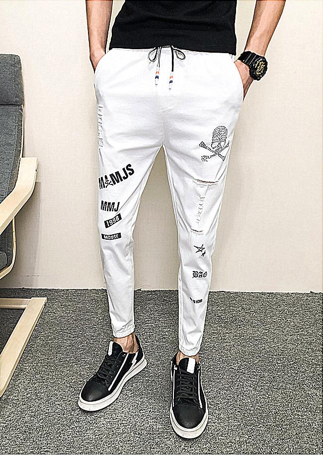 Quần Jogger Nam ống bo 9 tấc rách xước cùng họa tiết in độc đáo mang phong cách Hàn Quốc chất liệu vải Cotton cao cấp, co giãn nhẹ ôm vừa hợp xu hướng thời trang - Mẫu HOT