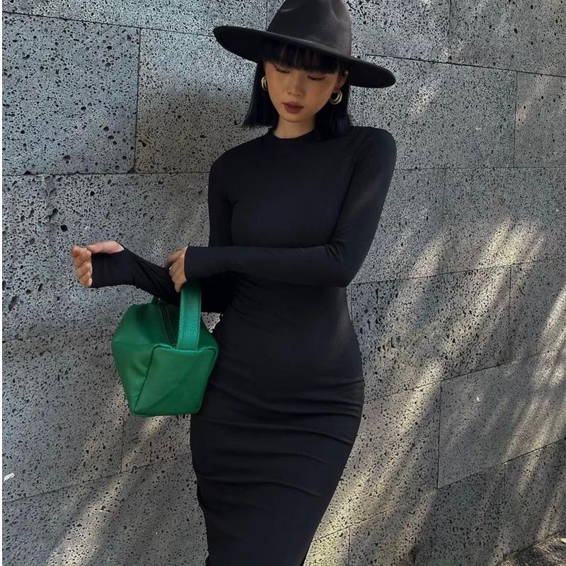 Đầm thun body cổ tròn tay dài xẻ tà