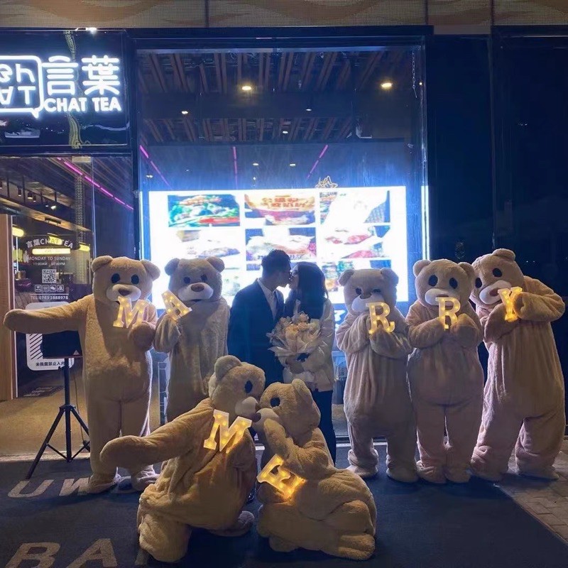 Mascot hoá trang gấu màu kem