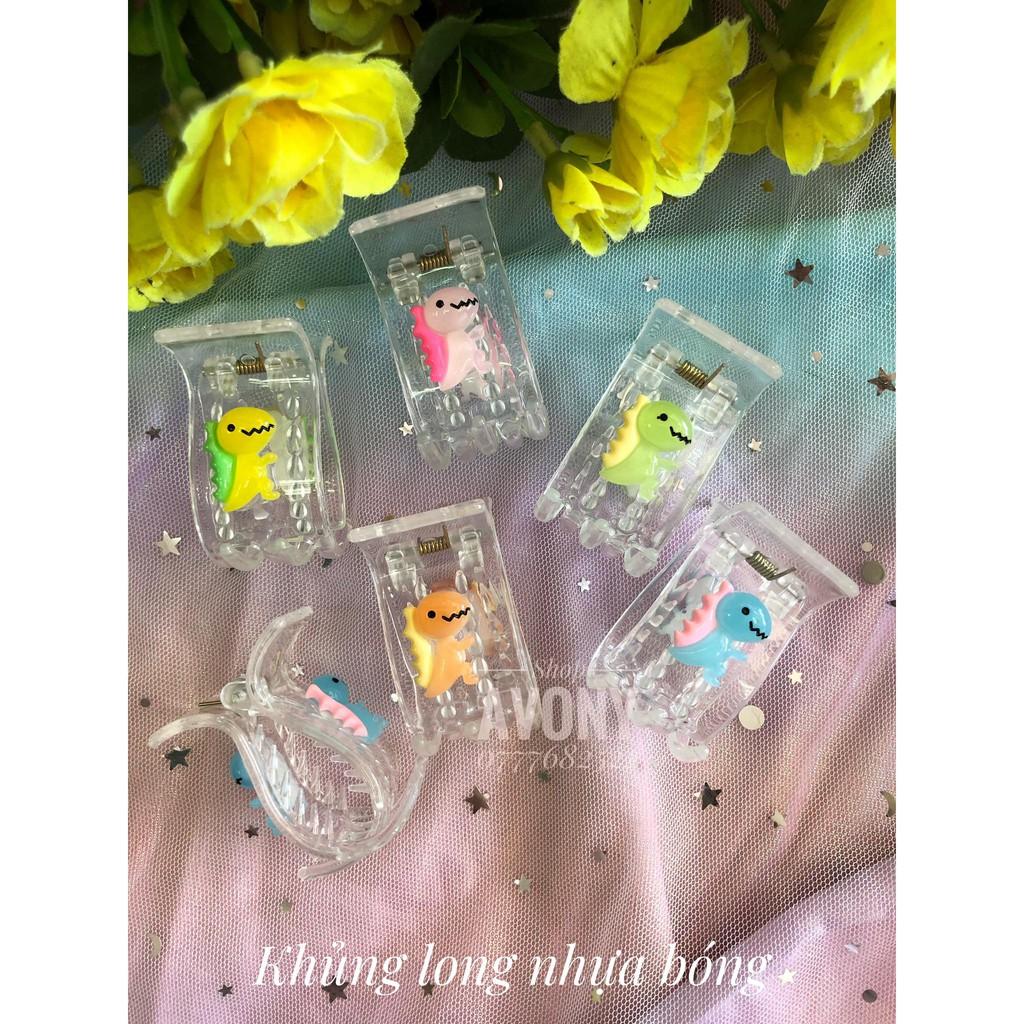 Kẹp tóc răng dẻo trong đính icon khủng long