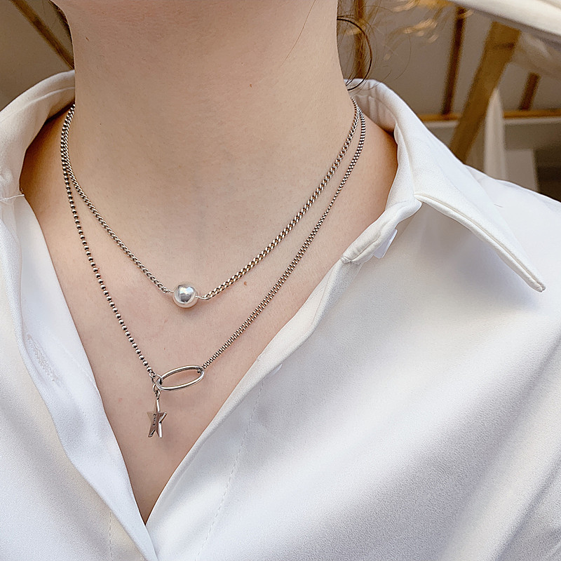 Vòng cổ titan không đen mix sao sành điệu