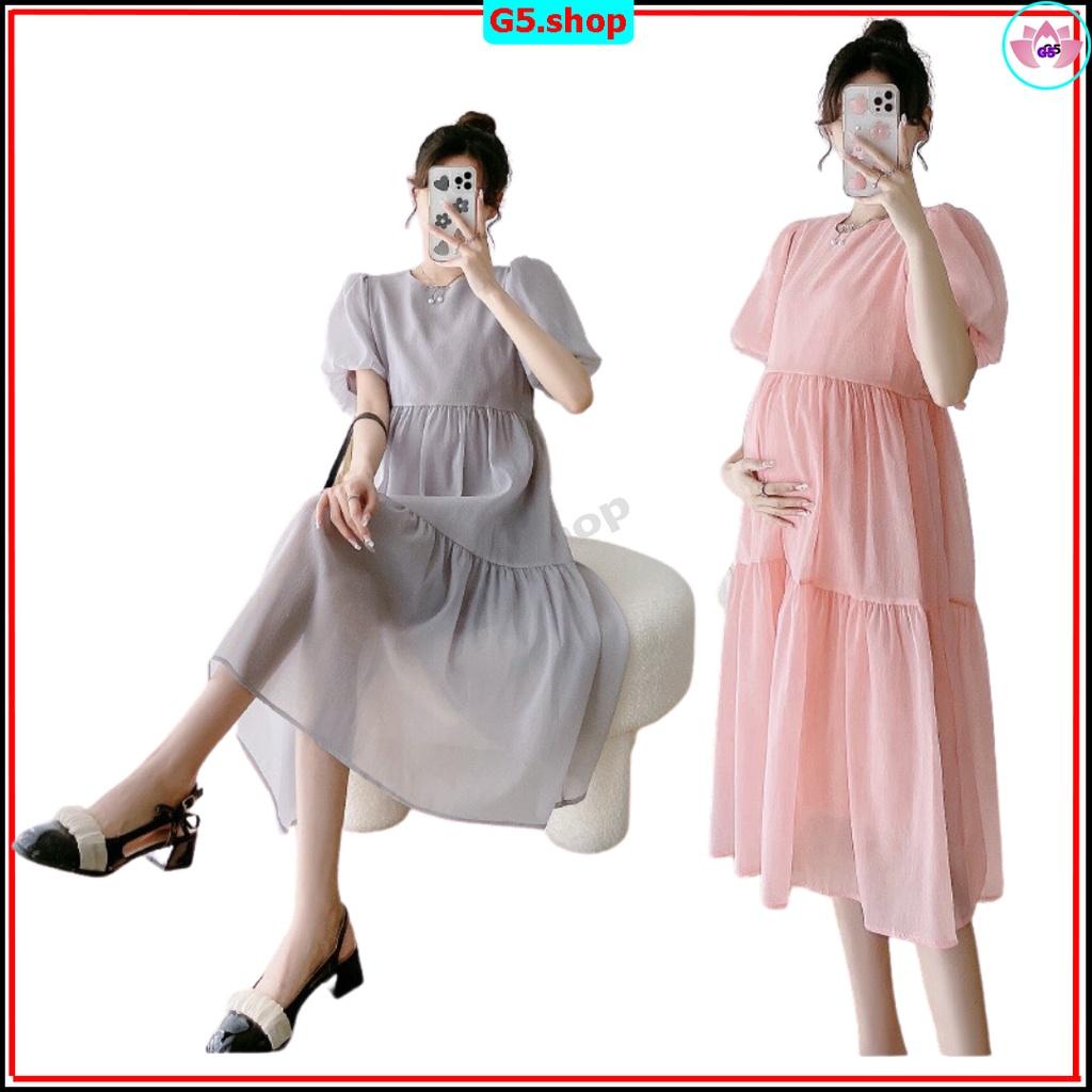 Đầm bầu sự kết hợp của dáng babydoll, váy bầu cùng chiếc cổ tròn xinh trong sắc màu nhẹ nhàng cho nàng vẻ duyên dáng