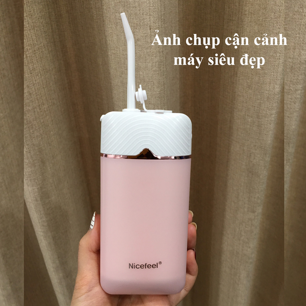 Máy tăm nước  Nicefeel mini. Tặng kèm túi du lịch cao cấp màu hồng.