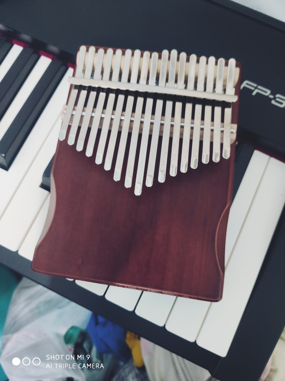 Đàn kalimba 17 phím gỗ nguyên khối tặng stick màu TONIC kalimba M17550- Nâu Mahogany