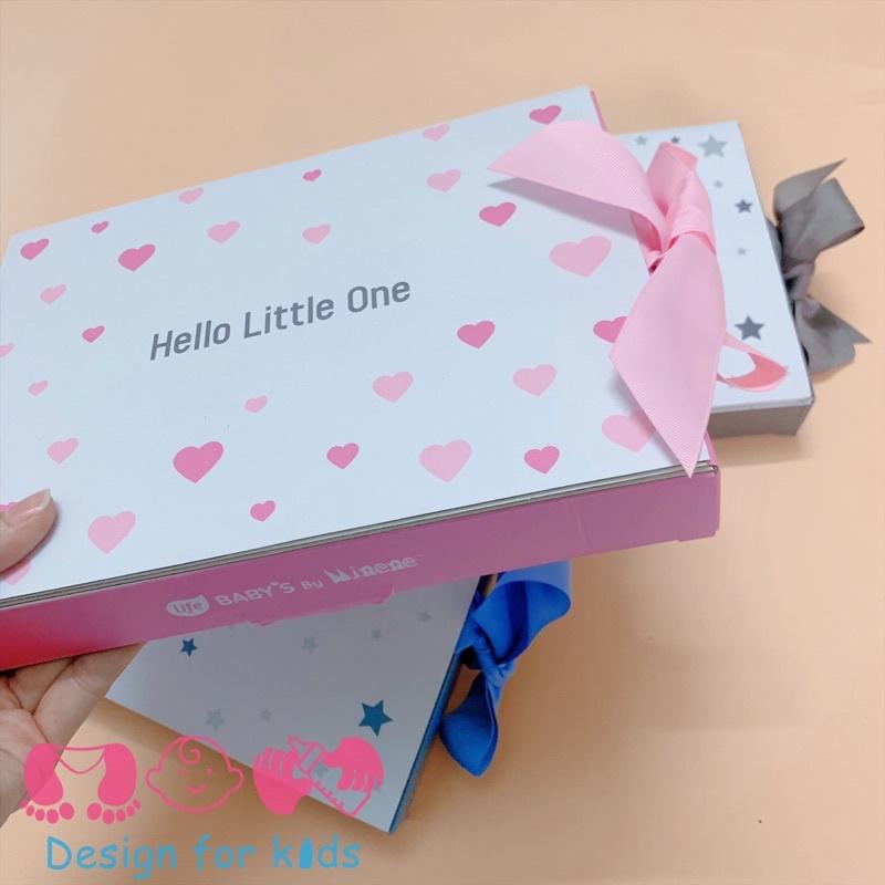 Quà tặng đầy tháng gồm body chip vạt chéo kèm quần dài liền tất và mũ cho bé