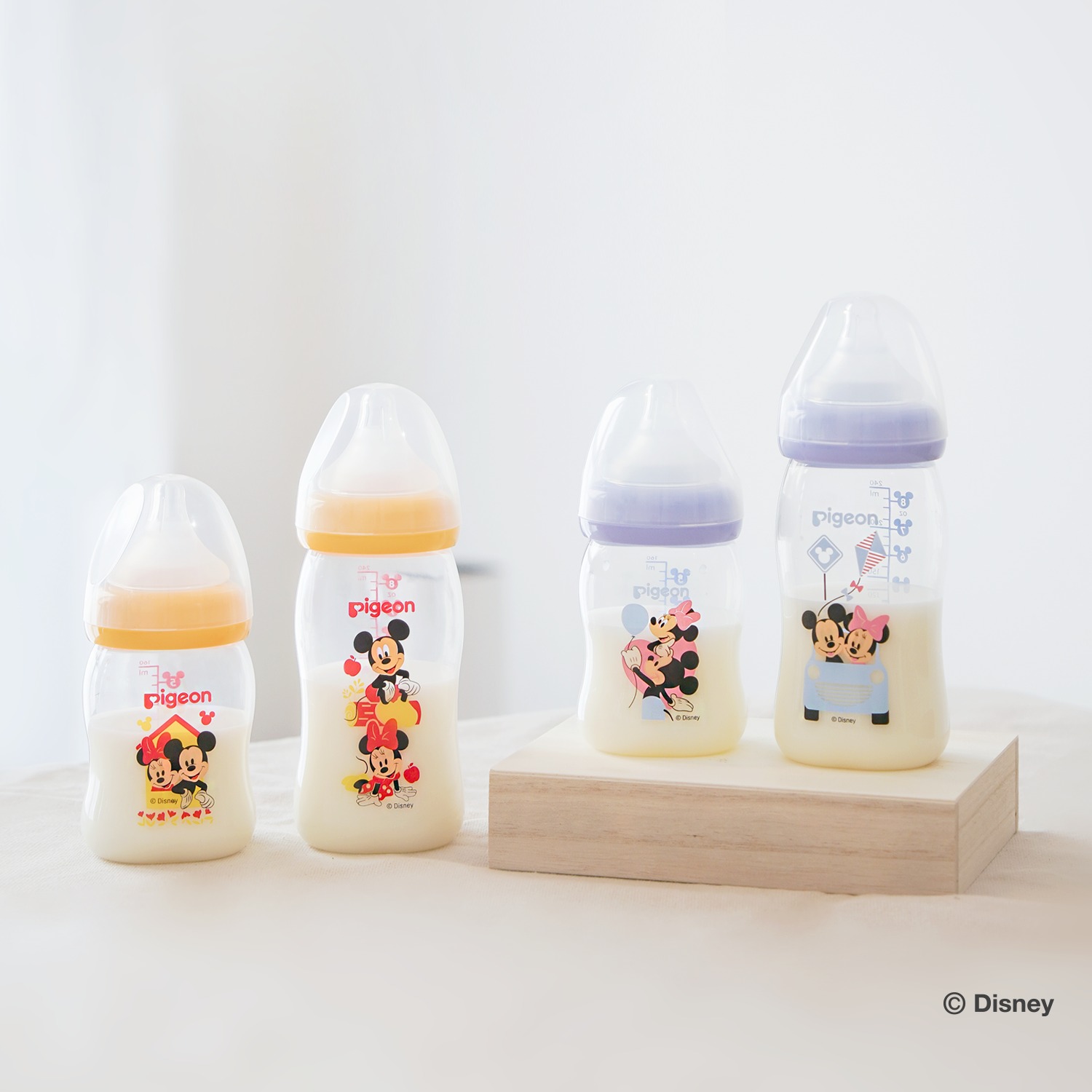 Bình Sữa Pigeon Softouch PP Plus Disney Baby - Màu Vàng
