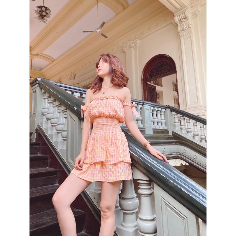 Đầm caro cam bo thun eo