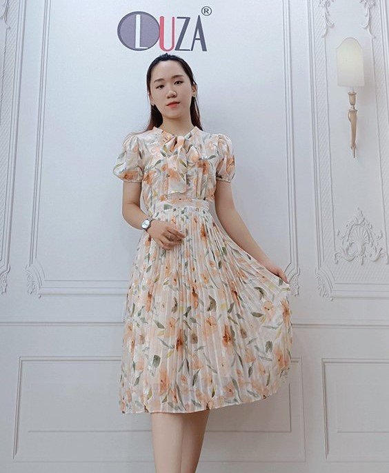Váy tơ hoa vàng to cổ nơ tay bo chun dập ly