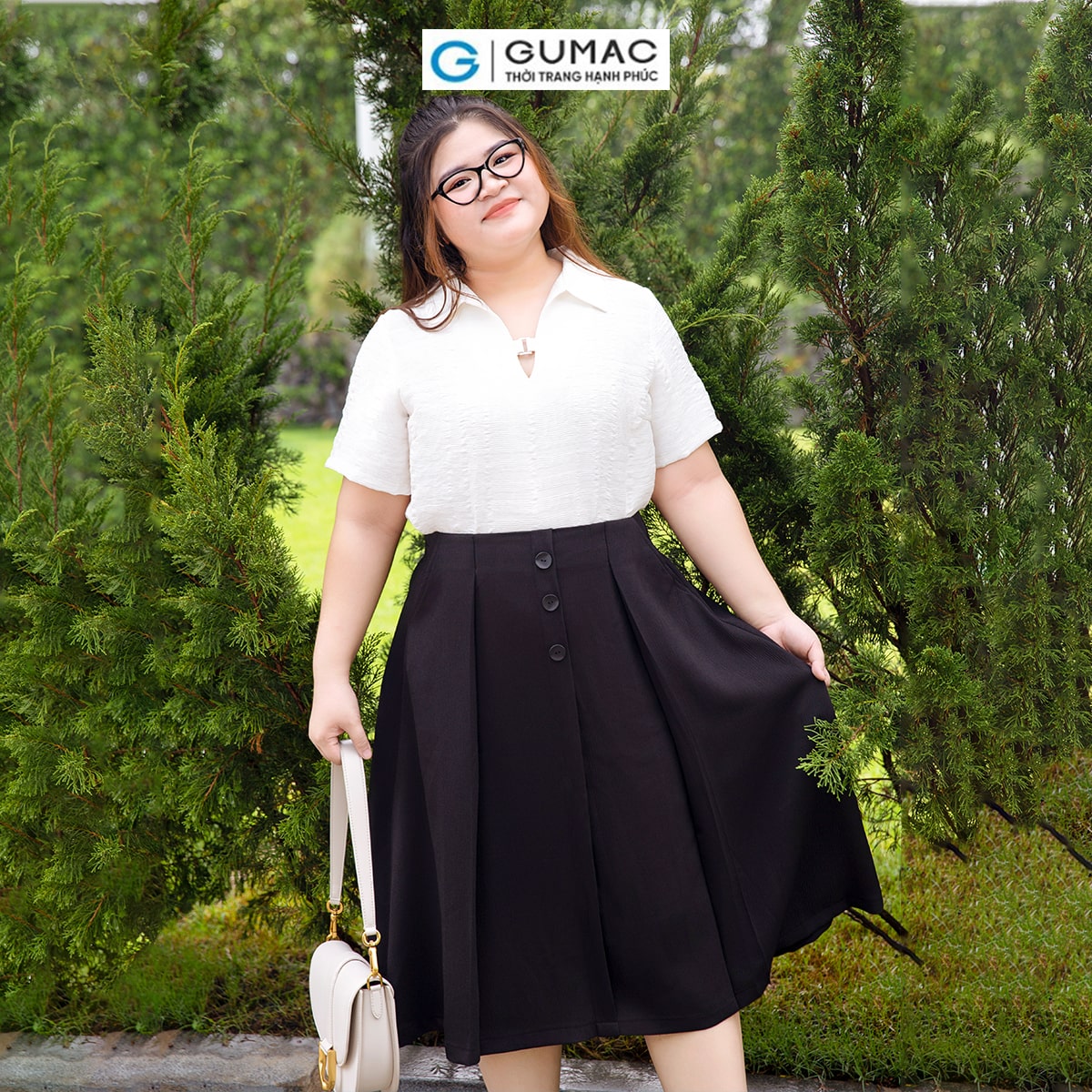 Chân váy A bigsize đính nút thời trang GUMAC VD10051