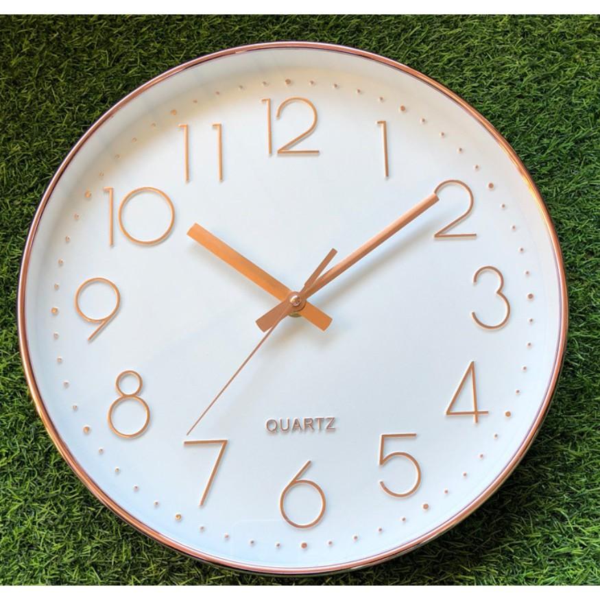 Đồng hồ treo tường kim trôi mạ vàng QUARTZ.