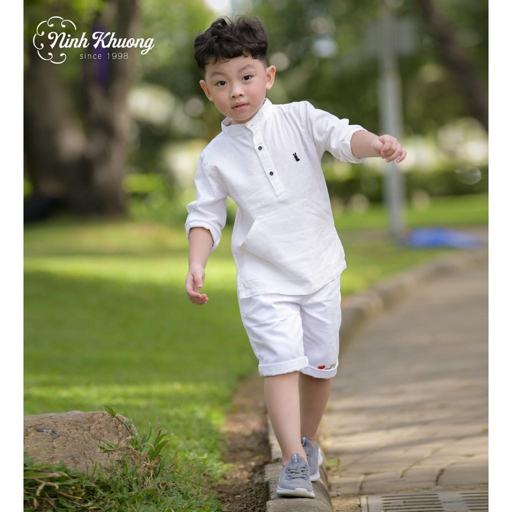 Áo sơ mi tay dài túi đắp bụng