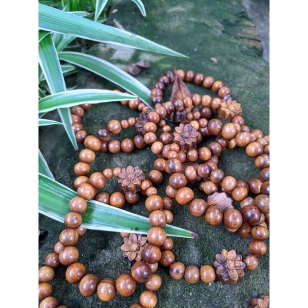 Vòng tay nữ mix charm hoa sen chuỗi hạt gỗ thơm bach màu tự nhiên