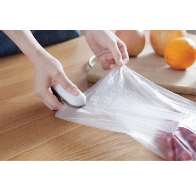 Máy cắt và hàn miệng túi Nhật Bản