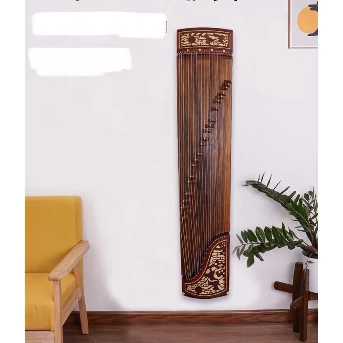 Móc treo đàn guzheng và cổ cầm trên tường