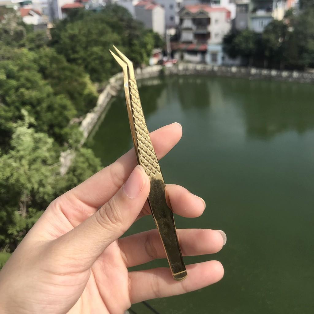 Nhíp vàng trống trơn trượt