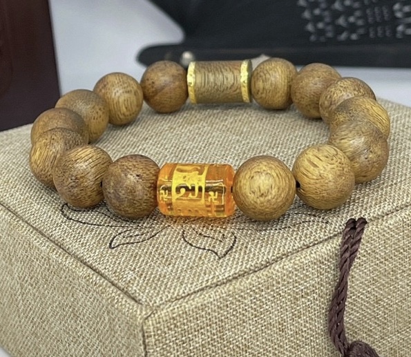 Vòng Tay Trầm Hương Mix Charm Hạt Tròn