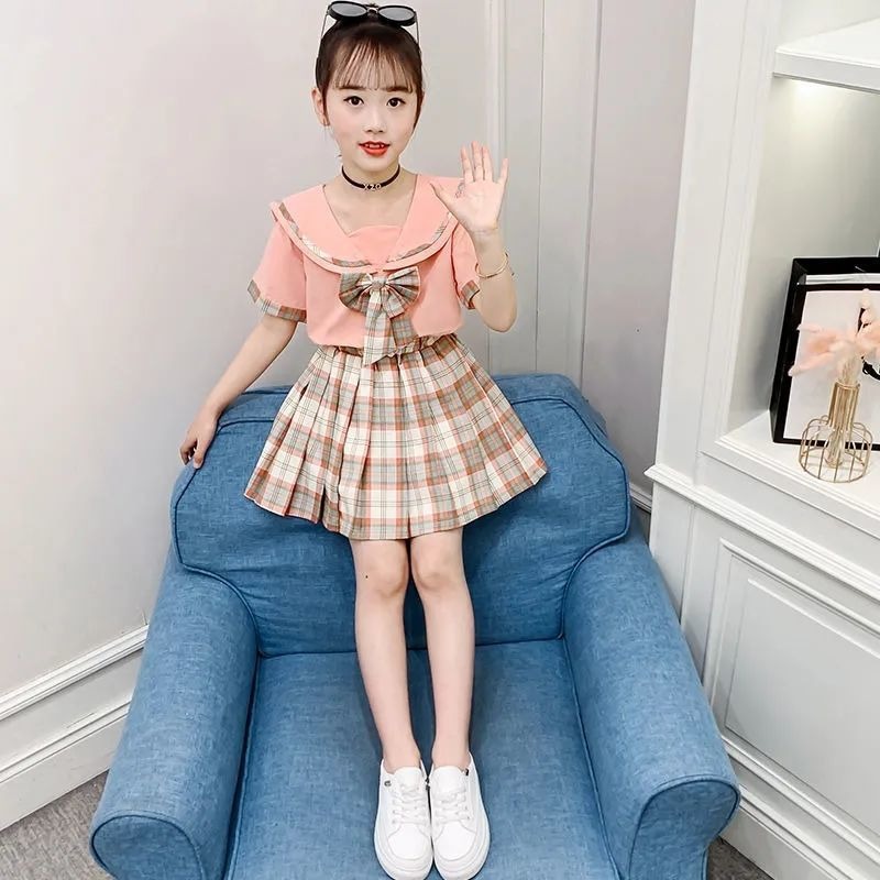 Bộ váy + áo ngắn tay màu hồng phong cách Hàn Quốc hiện đại trẻ trung cho bé cao từ 110-160cm