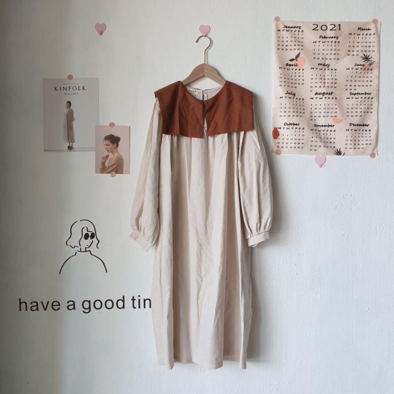 Đầm kem phối nâu free size