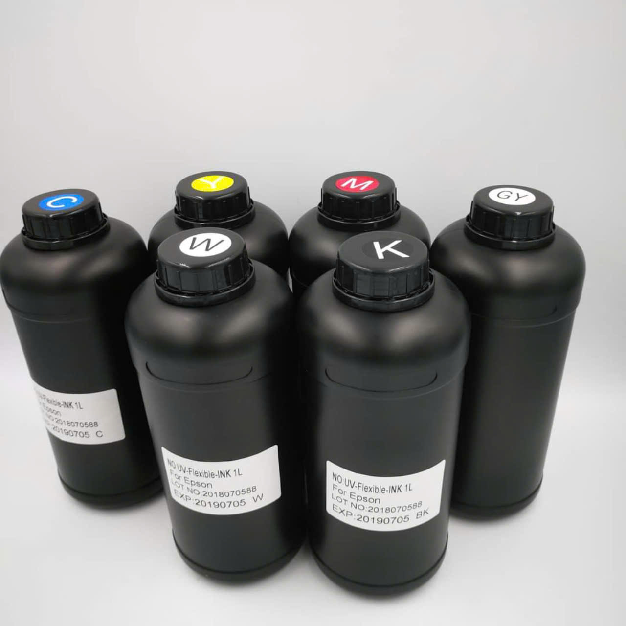 HCM-Mực UV Epson trung tính in quảng cáo cho mọi chất liệu,chai 1L cho printhead Epson DX5 DX7 I3200-U1 TX800 XP600 1390, hàng nhập khẩu