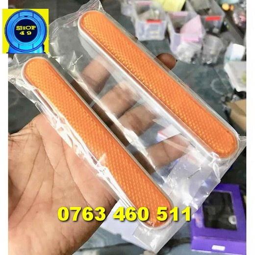 Mắt mèo dạ quang dài gắn phuộc trước