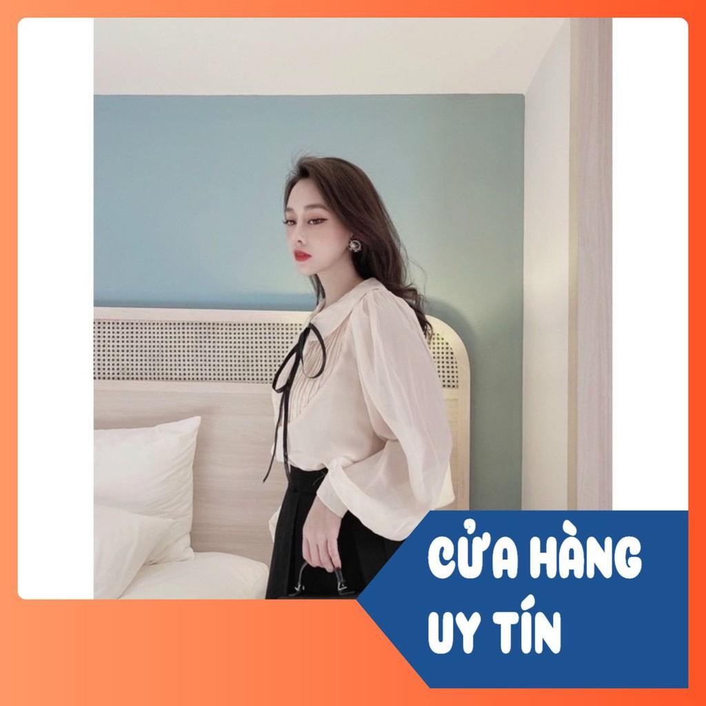 ÁO SƠ MI MÀU BE CỔ SEN XẾP LY NGỰC NƠ ĐEN