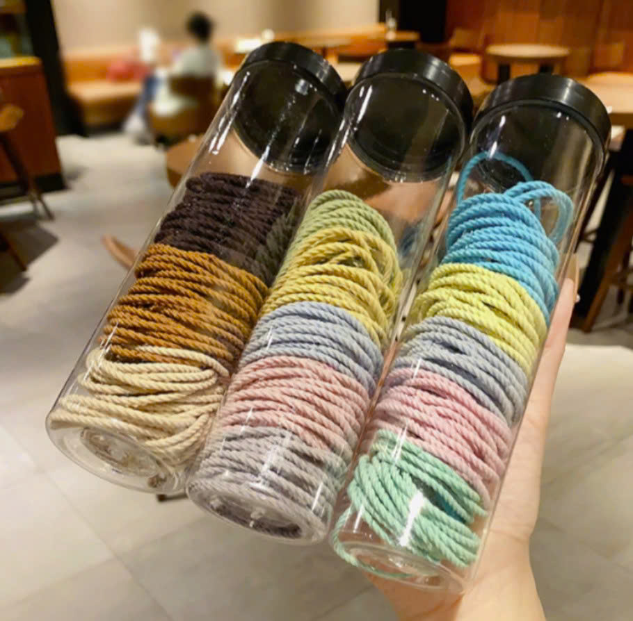 ( Set 2) Ống 100 dây buộc tóc màu trơn co giãn tốt, thun cột tóc không đau cho bé gái