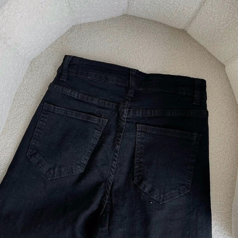 Quần jeans xẻ gấu Bu Jian