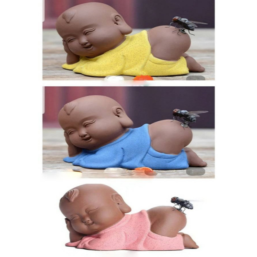 Chú tiểu ruồi gốm sứ
