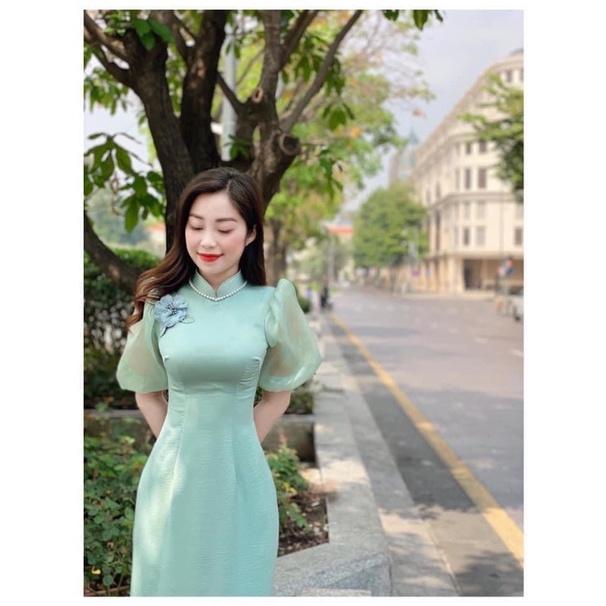 Áo dài lụa tay phối voan hoa ngực màu xanh ngọc