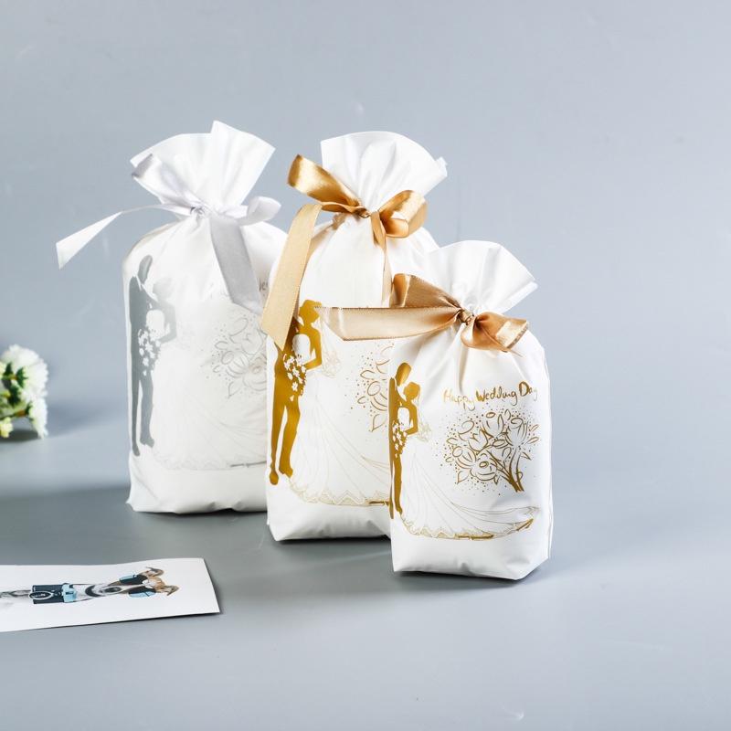 Túi đựng bánh kẹo có dây buộc, nhiều họa tiết, bao bì đựng bánh buộc dây 50 túi/sp - KING OF OPP
