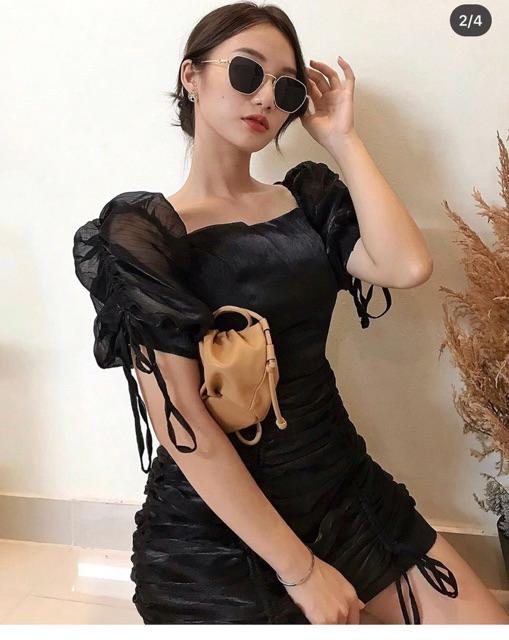 Đầm xốp đen rút thân