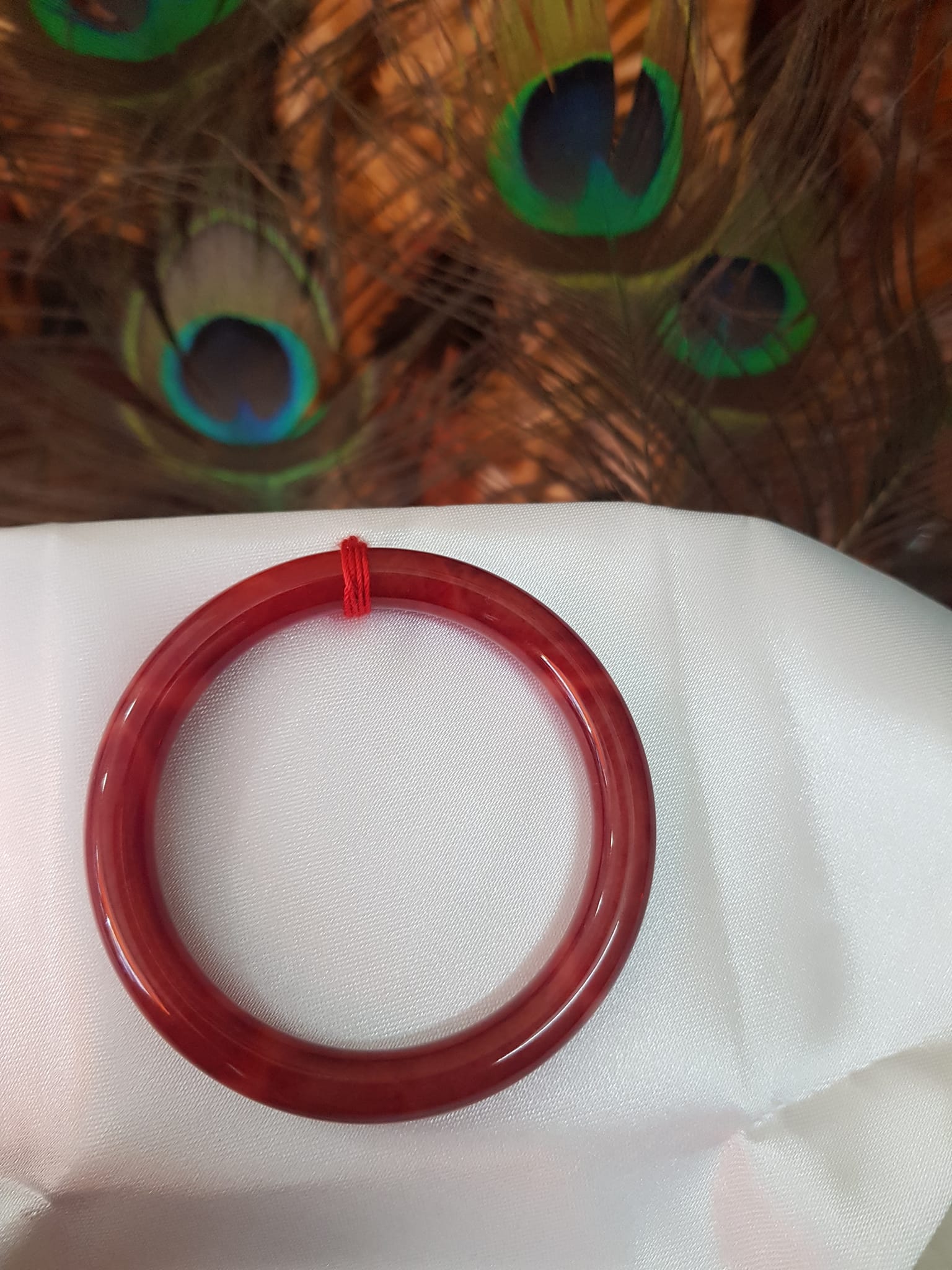 Vòng Nữ đá cẩm thạch Đỏ Đẹp 50mm x cọng 7,2mn Màu đỏ đậm vân vân đậm nhạt đều đẹp Nữ mệnh Hỏa Thổ 49kg - 54kg ạ