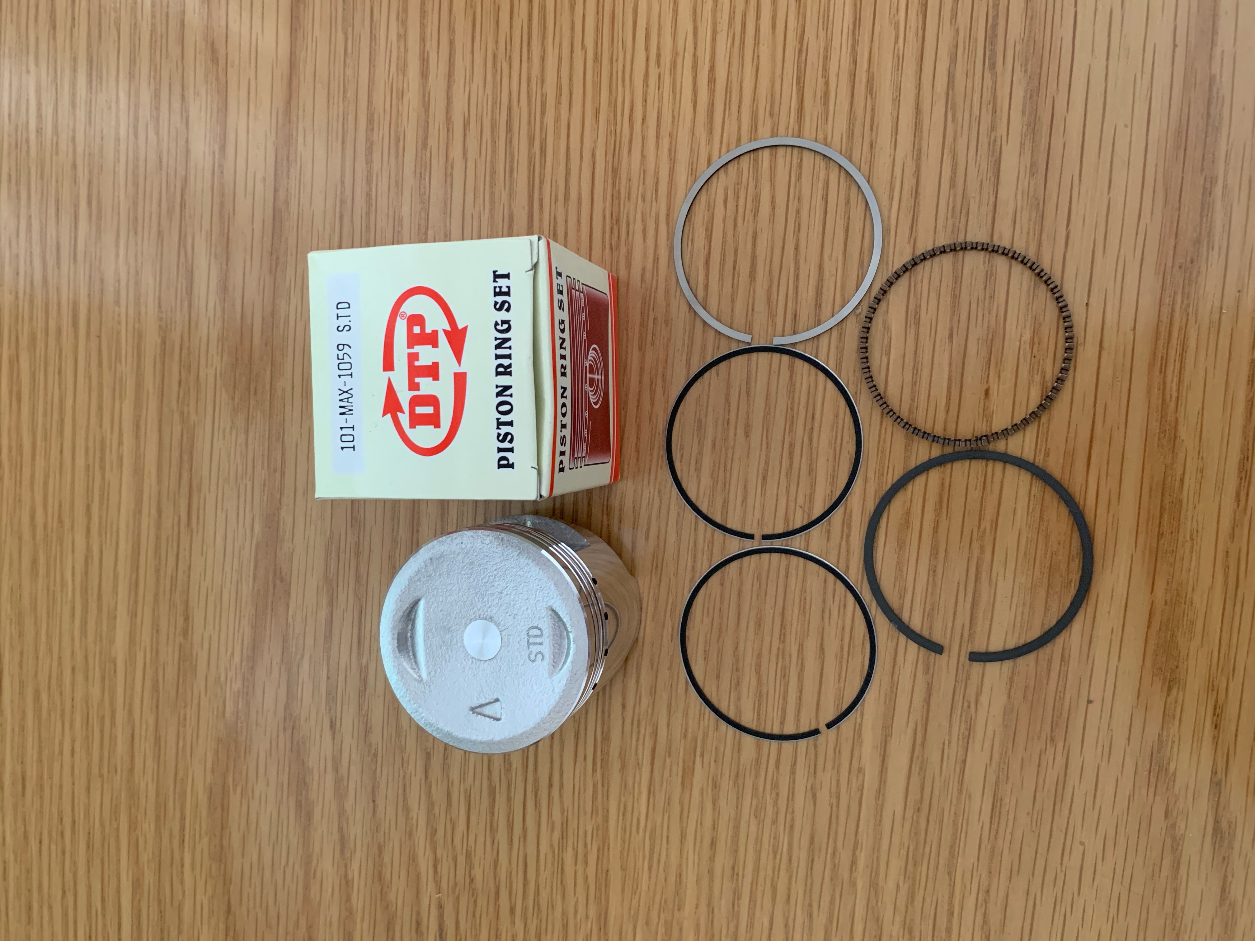 Bộ piston (xéc măng) bạc dành cho xe SUZUKI MAX (cos 0-4)