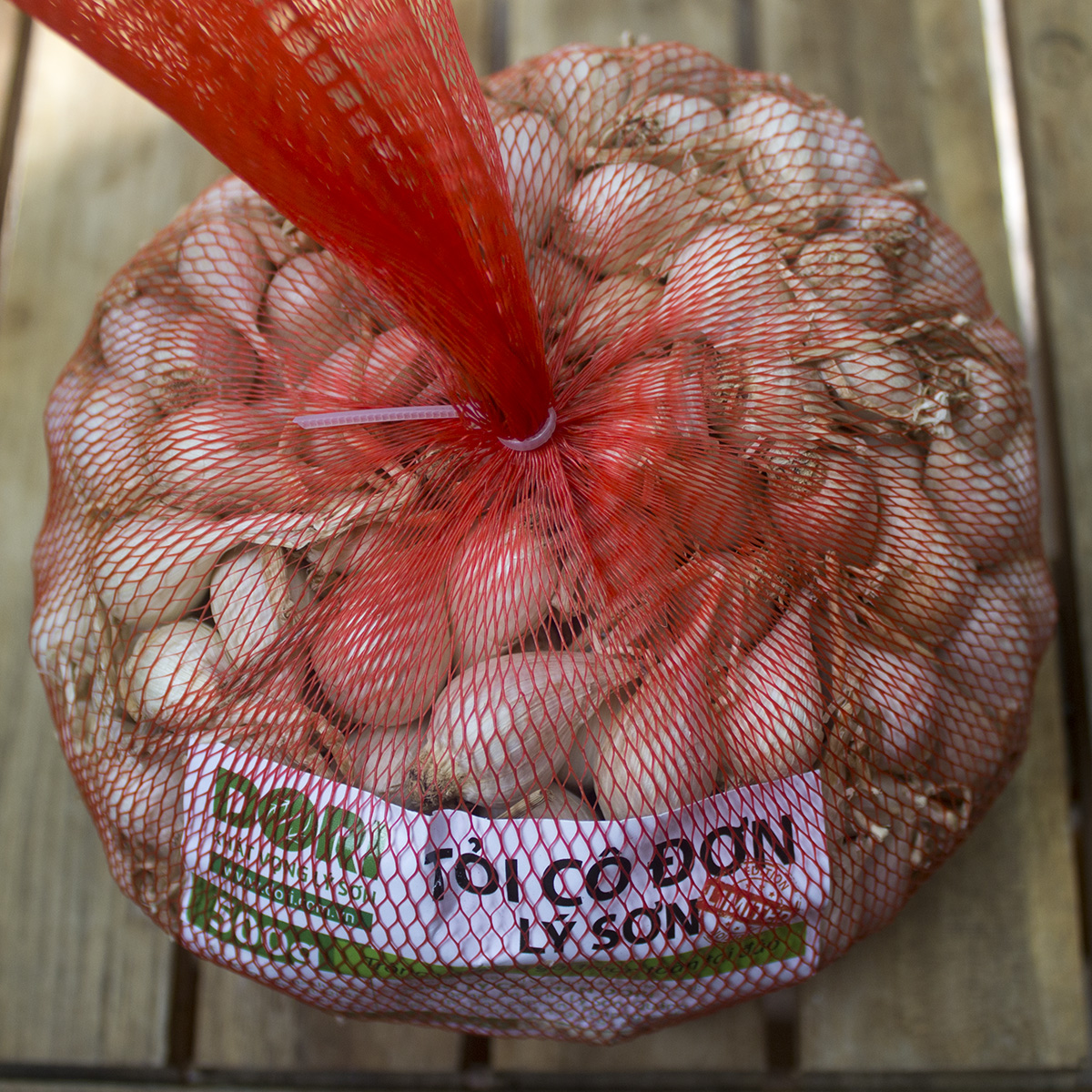 Đặc Sản Quảng Ngãi - Tỏi Cô đơn Lý Sơn - Túi lưới 500g - Trồng tại đảo Lý Sơn - Cam kết đúng xuất xứ - Hoàn tiền 200% nếu sai cam kết - Dùng để ăn sống hoặc chế biến