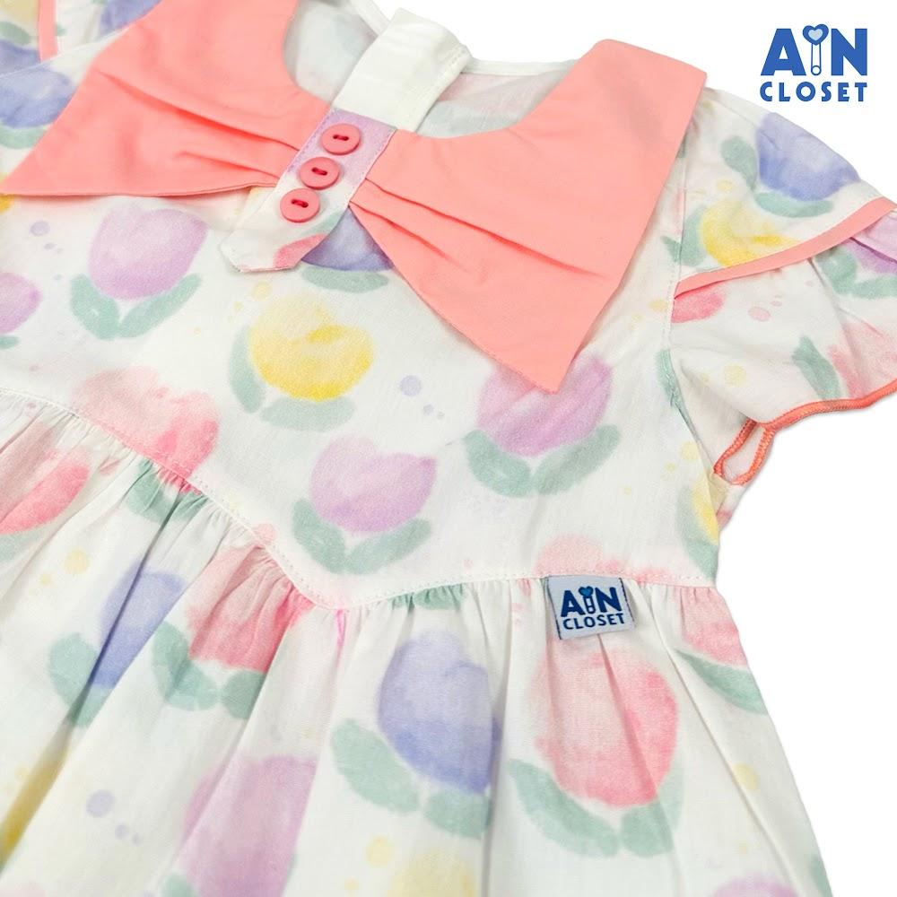 Đầm bé gái họa tiết Đóa Tulip cổ nơ hồng cotton - AICDBGW1XQHI - AIN Closet
