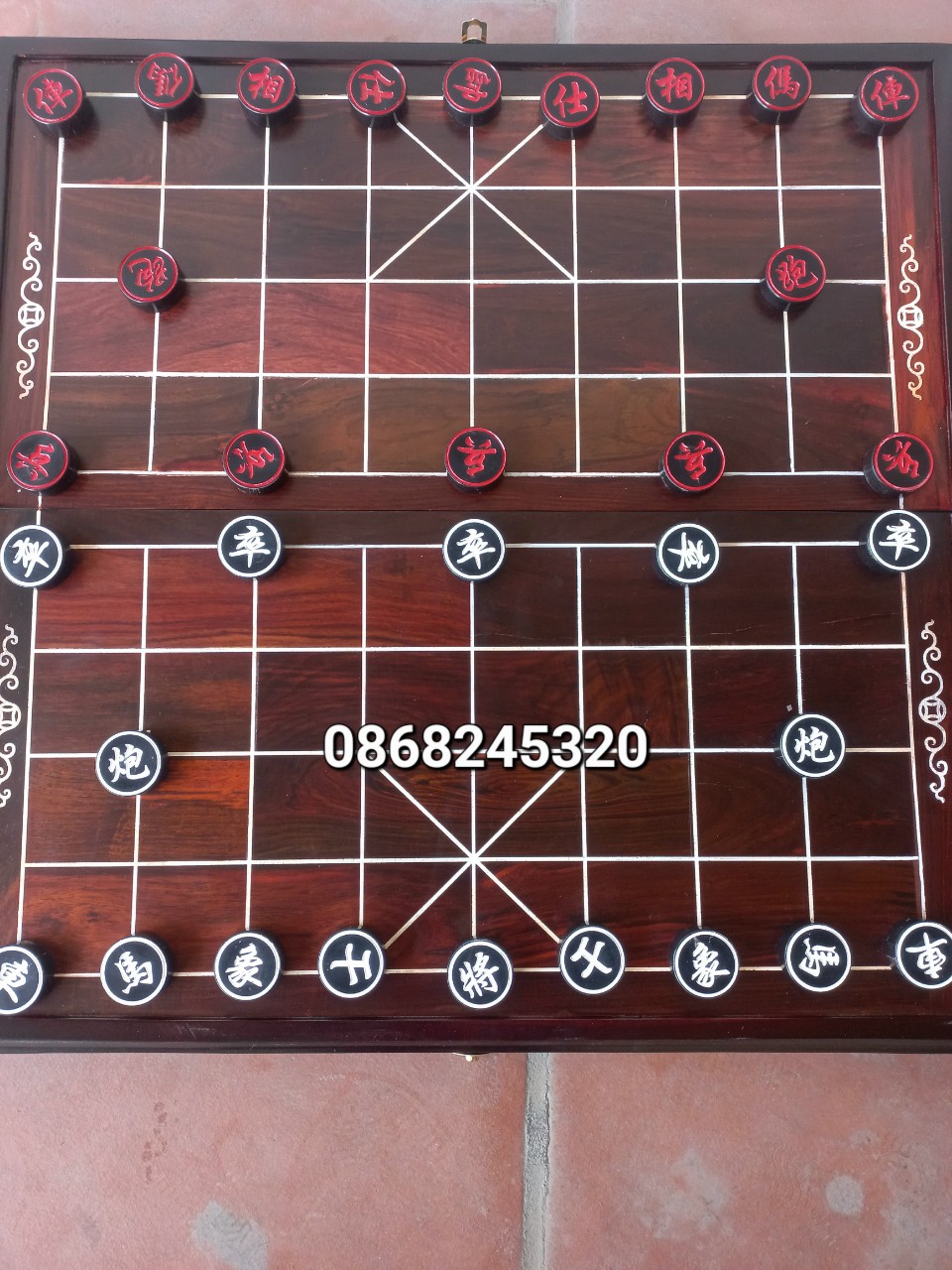 Bộ bàn cờ tướng gỗ trắc kt 48×50×3cm và quân sừng kt 3.7×1.2cm