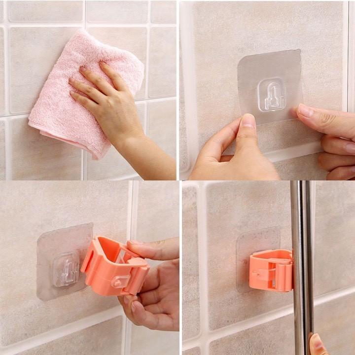 Móc kẹp chổi kẹp cây lau nhà dán tường cao cấp có cây lăn kép độc đáo chịu lực lên đến 6kg.