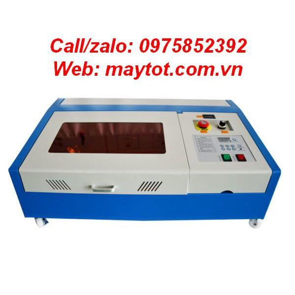 Máy cắt khắc laser model YH-3020 khắc tem trên vật liệu phi kim loại như tem sừng bò, gỗ, con dấu nhựa đỏ,pha lê,..