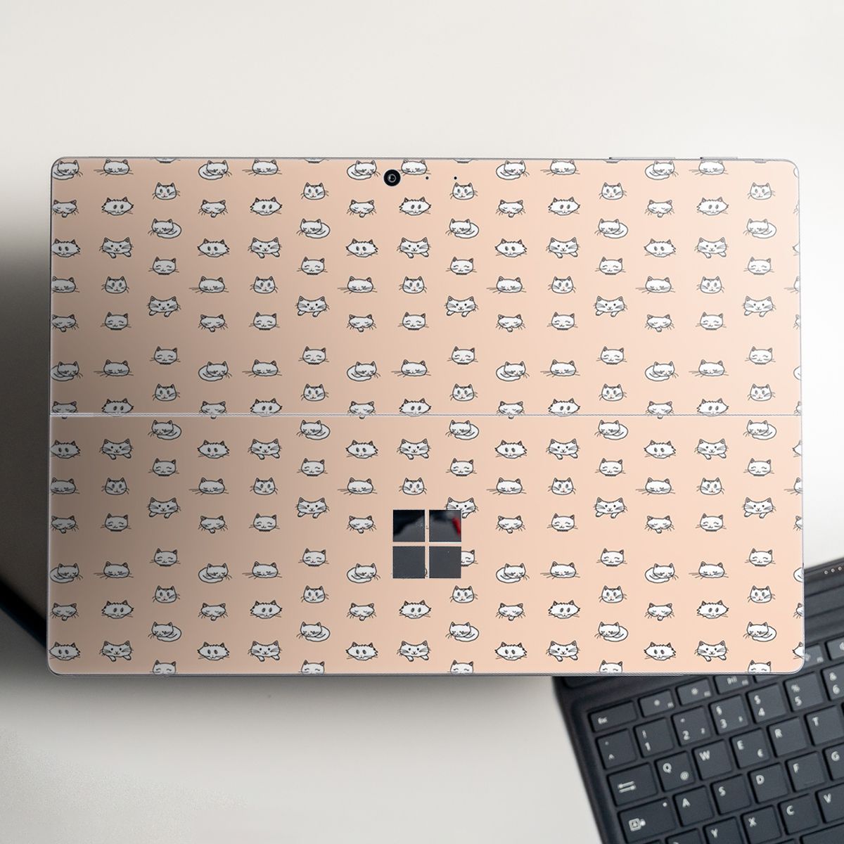 Skin dán hình mèo con - stic252 cho Surface Go, Pro 2, Pro 3, Pro 4, Pro 5, Pro 6, Pro 7, Pro X