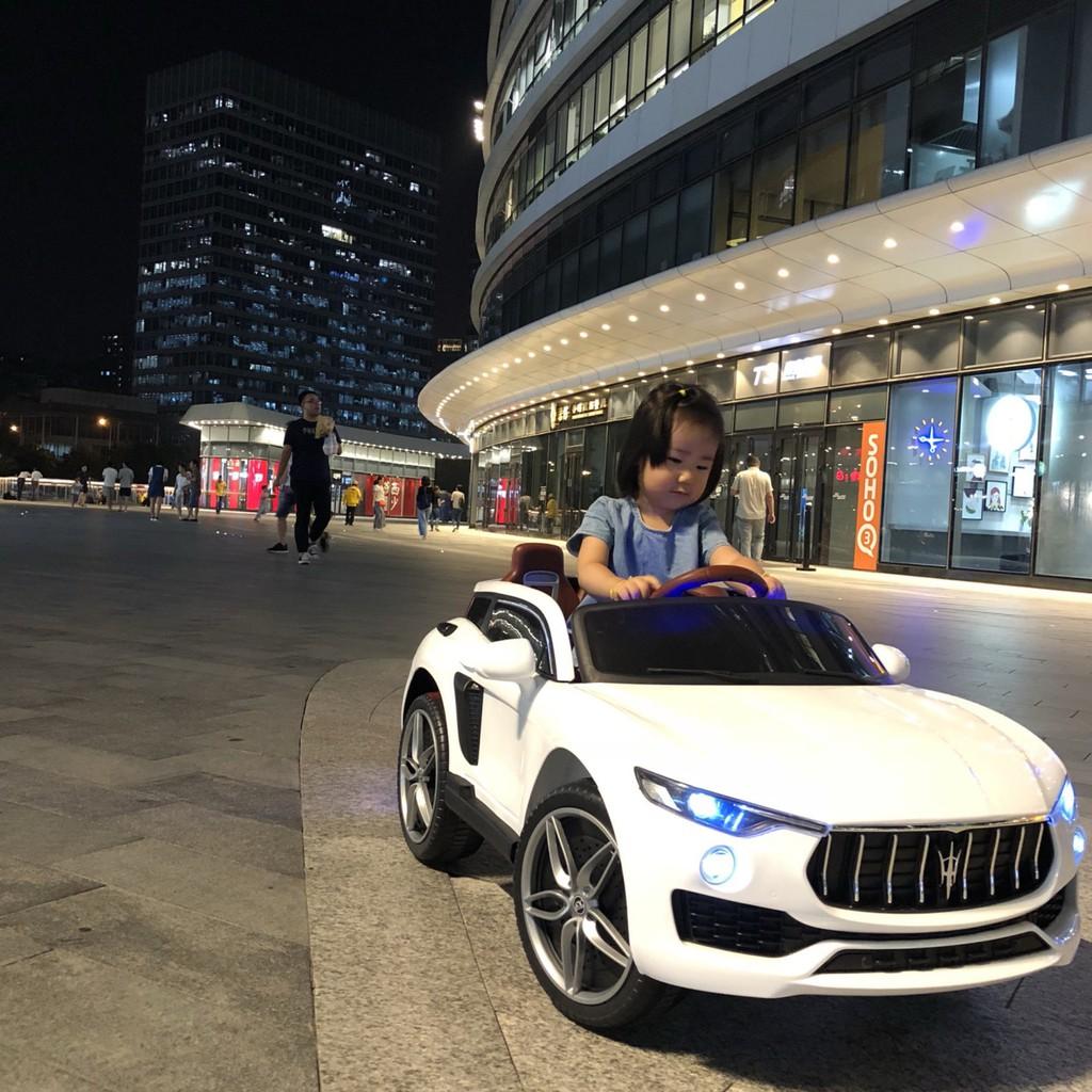 Ô tô xe điện đồ chơi KUPAI 2021 vận động cho bé 2 chỗ ngồi 4 động cơ (Đỏ-Trắng-Cam)