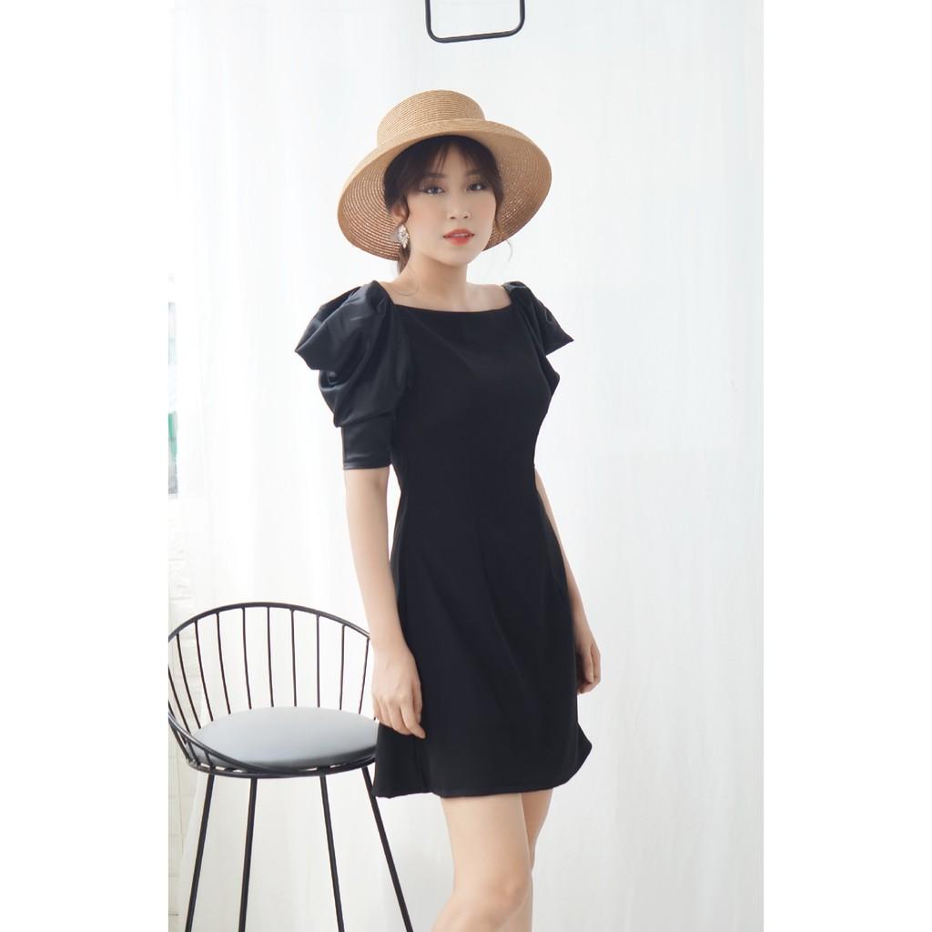Đầm dự tiệc thiết kế cách điệu ở tay và lưng (chữ V). Có 2 màu trắng và đen
