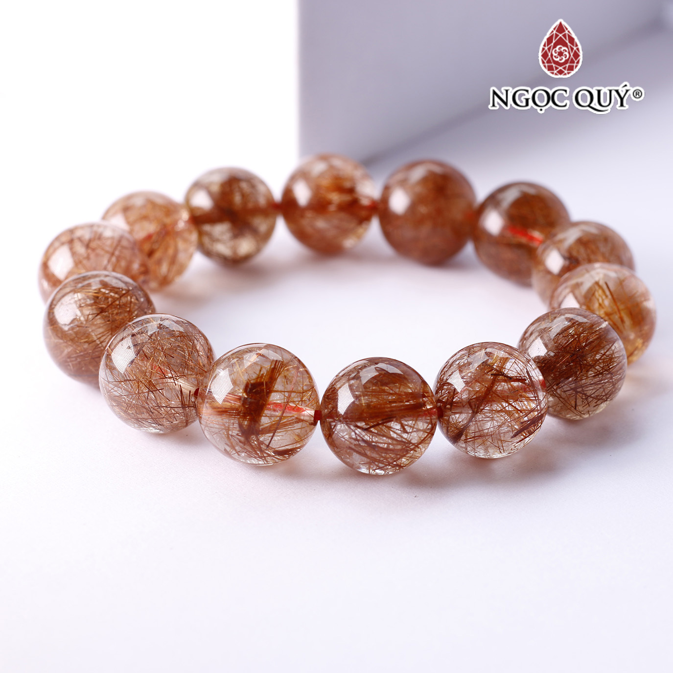 Vòng tay đá thạch anh tóc đỏ AAA hạt 14mm - Ngọc Quý