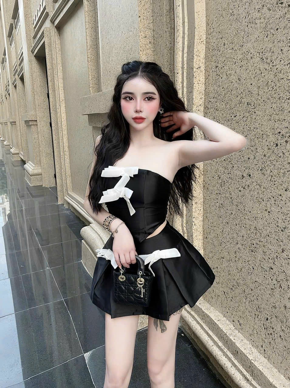 Set áo cúp ngực nhọn đính nơ tapta phối chân váy