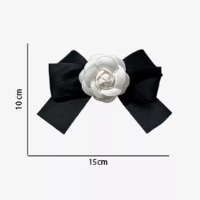 Hoa cài trang trí phối nơ zuy băng siêu đẹp, ảnh shop tự chụp