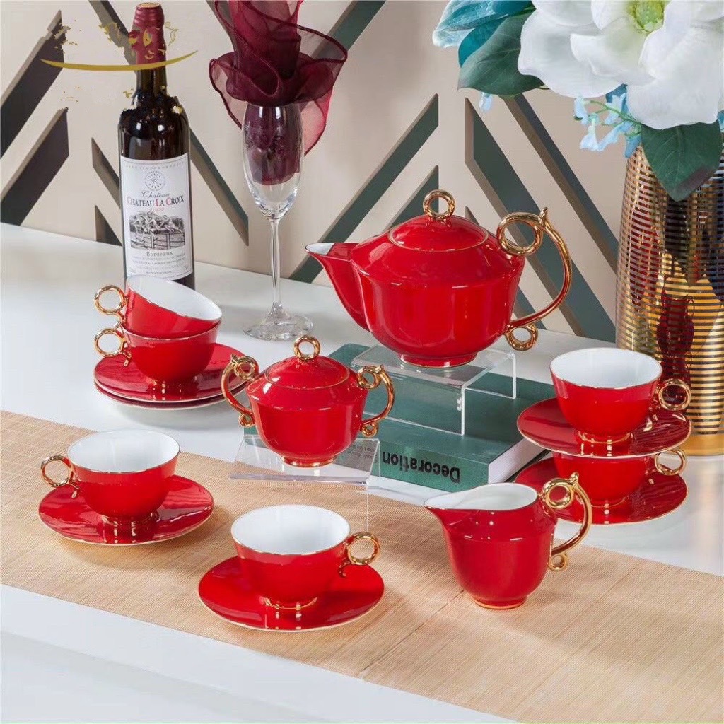 BỘ ẤM CHÉN PHA TRÀ SỨ XƯƠNG ĐỎ QUAI VÀNG CAO CẤP