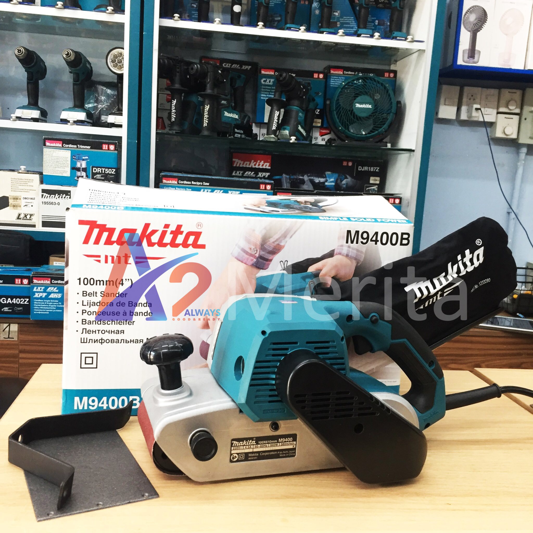 Máy chà nhám băng 100x610 940W Makita MT