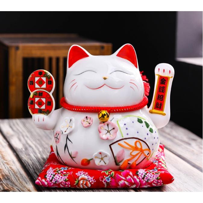 MÈO THẦN TÀI VẪY TAY. . Có vẫy tay: 22 cm - 26 cm Chất liệu gốm sứ Nhật Bản ( Mèo +hộp + nệm+ sạc điện )