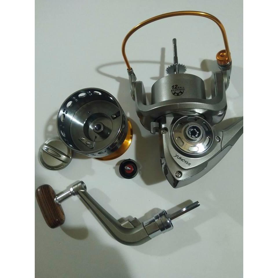 Bộ cần câu 2 khúc 2m7 ,máy yumoshi lc 7000 kèm trọn bộ phụ kiện